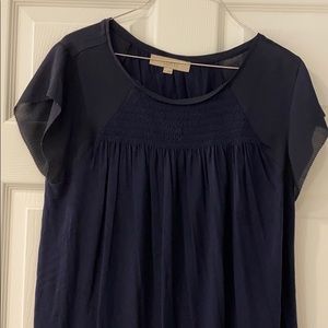 Navy blue smocked front short sleeve shirt